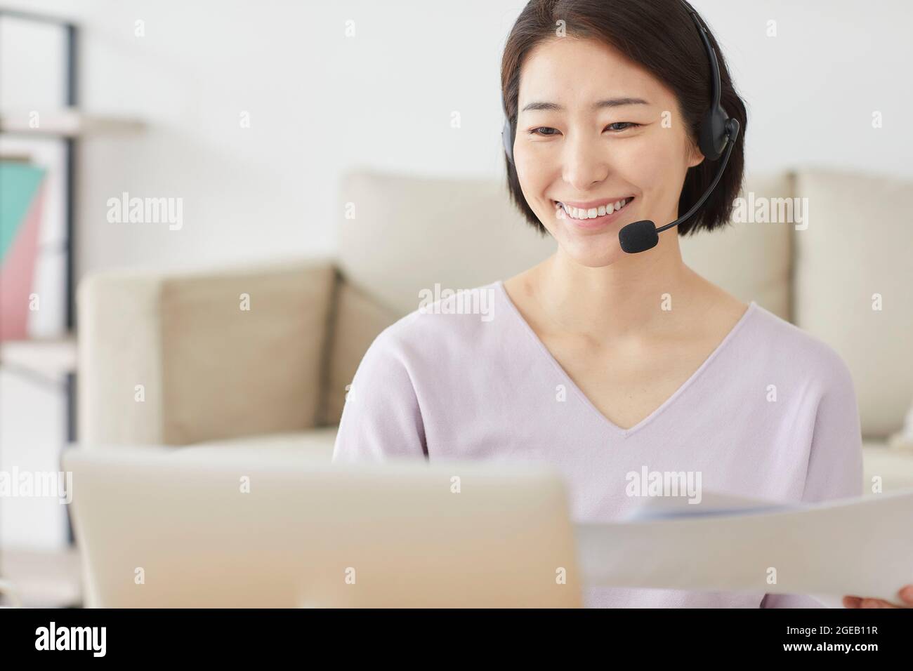 Japanese woman working from home Stock Photo