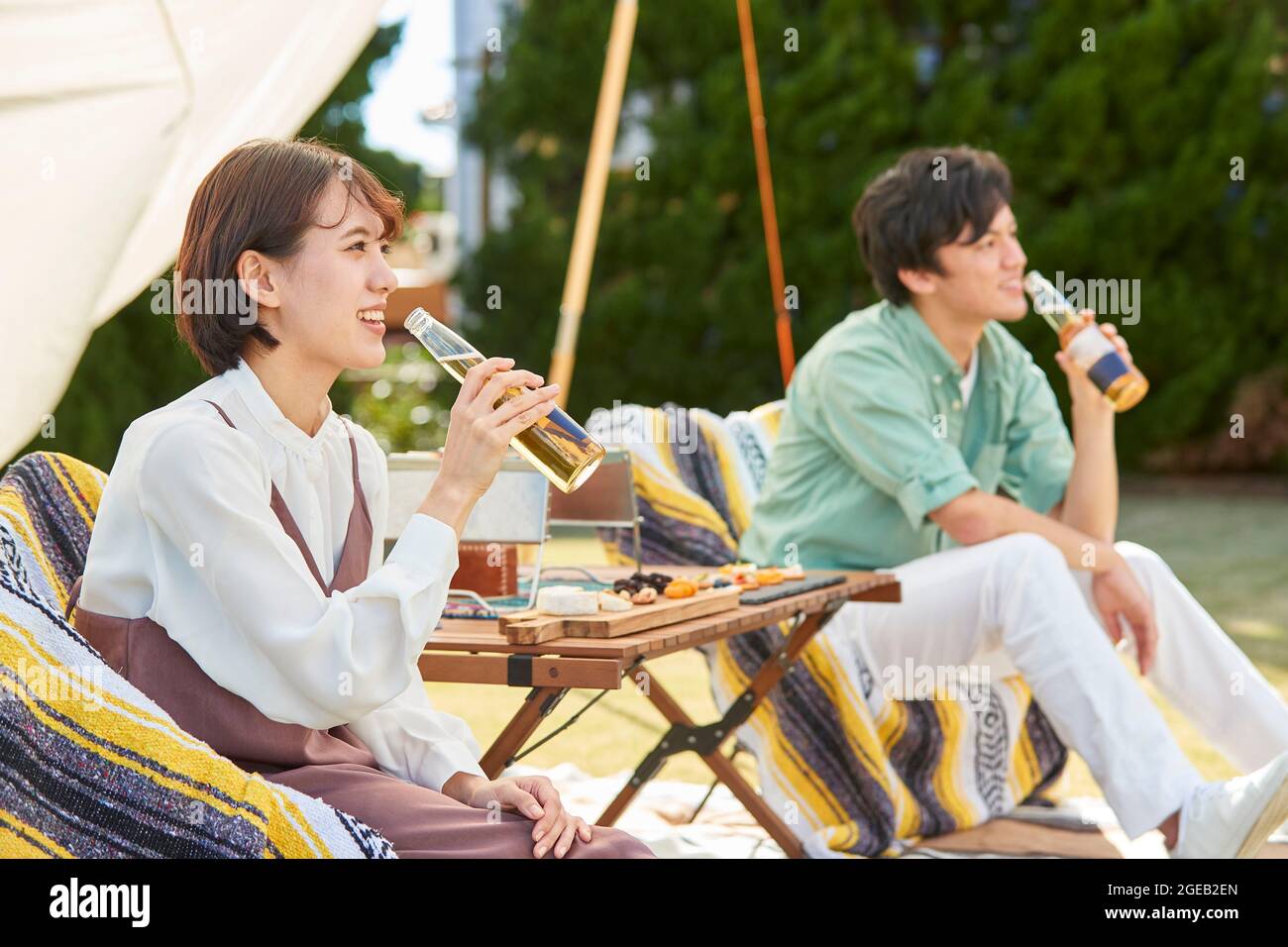 Japanese friends having a party in the garden Stock Photo