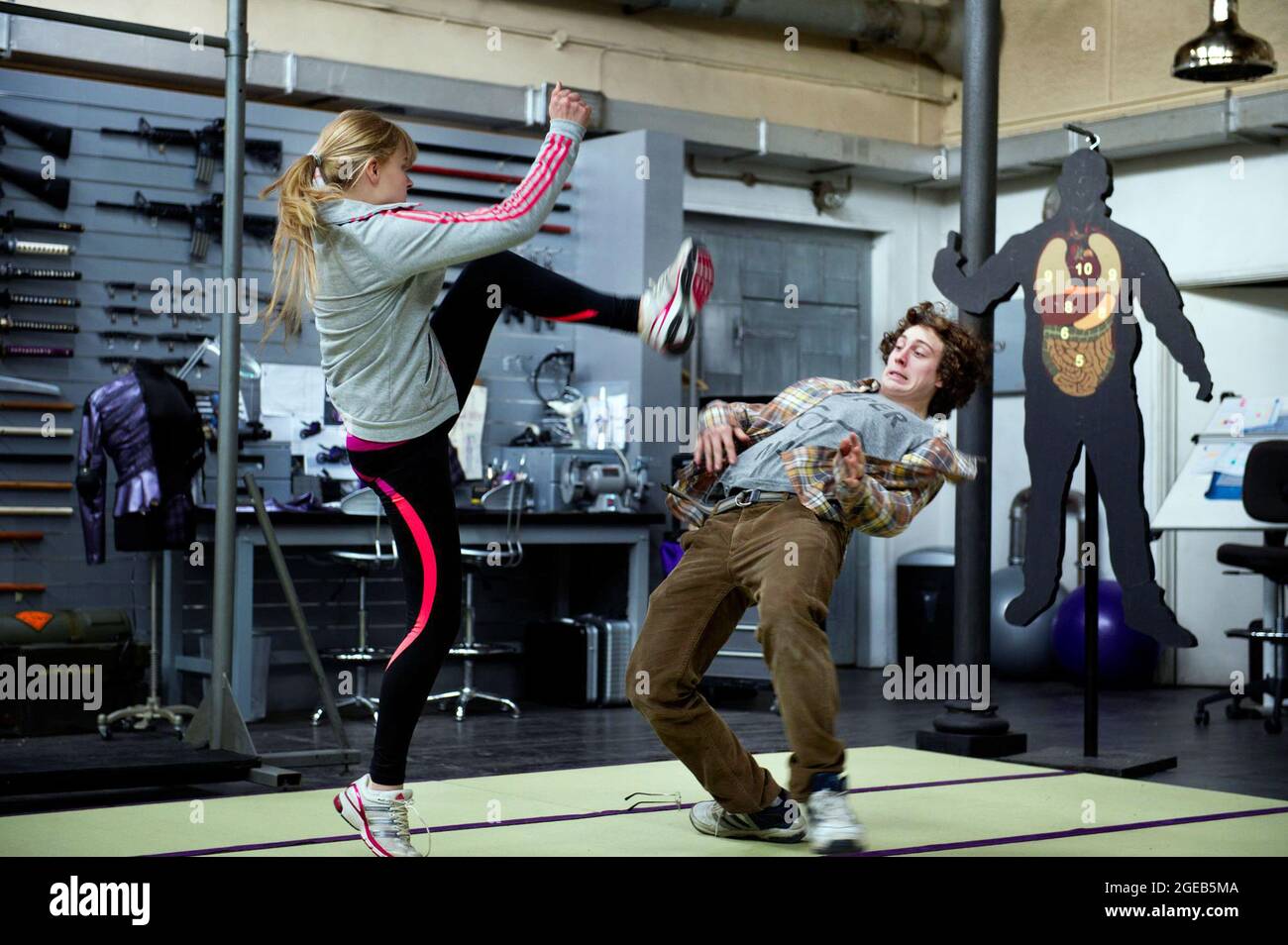 Los Angeles. CA. USA. Chloe Moretz and Aaron Taylor-Johnson in the  ©Universal Pictures new film: Kick-Ass 2 (2013). Plot: The costumed  high-school hero Kick-Ass joins with a group of normal citizens who, image size:1300x954