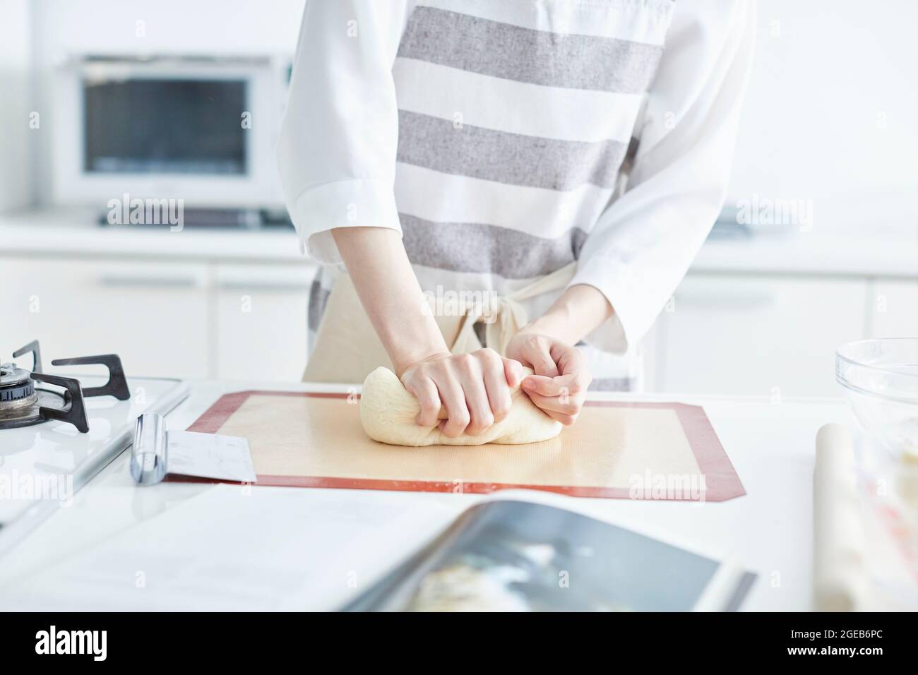Japanese woman cooking at home Stock Photo - Alamy