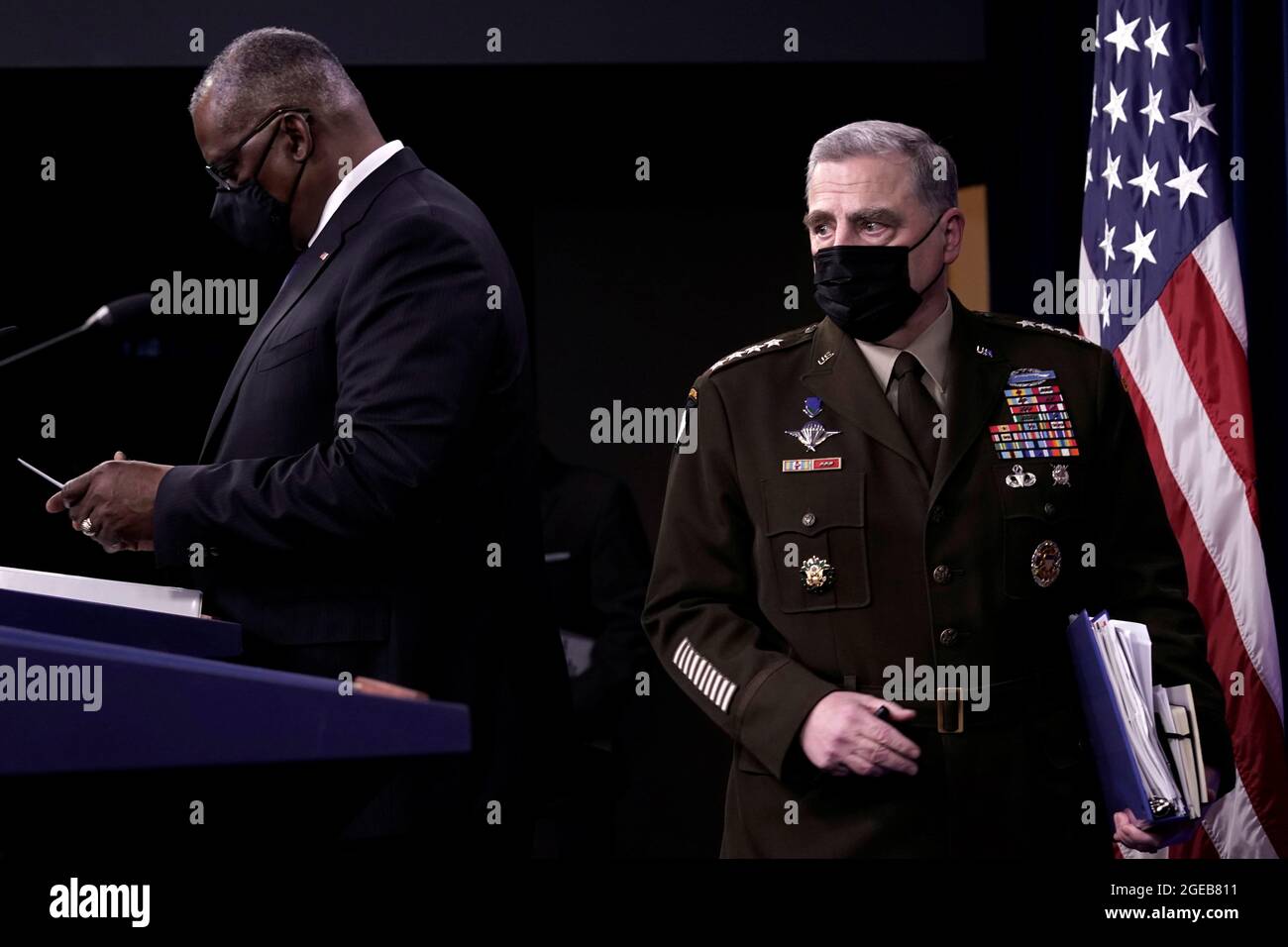 U.S. Defense Secretary Lloyd Austin and Joint Chiefs of Staff Chairman Army General Mark Milley arrive at a news briefing at Pentagon in Arlington, Virginia, U.S., August 18, 2021. REUTERS/Yuri Gripas Stock Photo