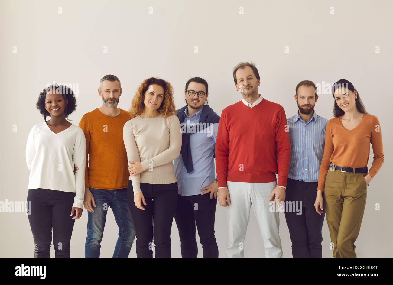 Group of diverse people in comfortable casual wear standing on white studio background Stock Photo