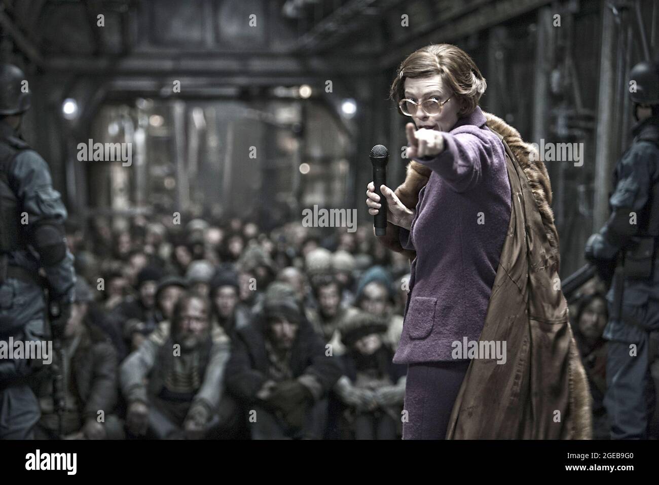 Los Angeles. CA. USA. Tilda Swinton in the ©Weinstein Company new film:  Snowpiercer (2013). Plot: In a future where a failed global-warming  experiment kills off most life on the planet, a class, image size:1300x956