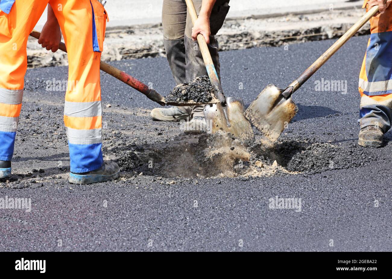 Team of road workers hi-res stock photography and images - Alamy