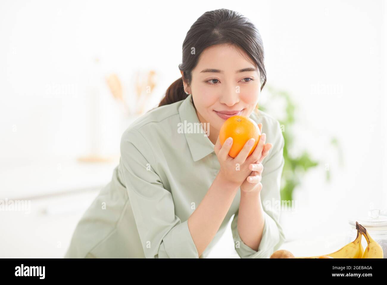 Japanese woman enjoying time at home Stock Photo