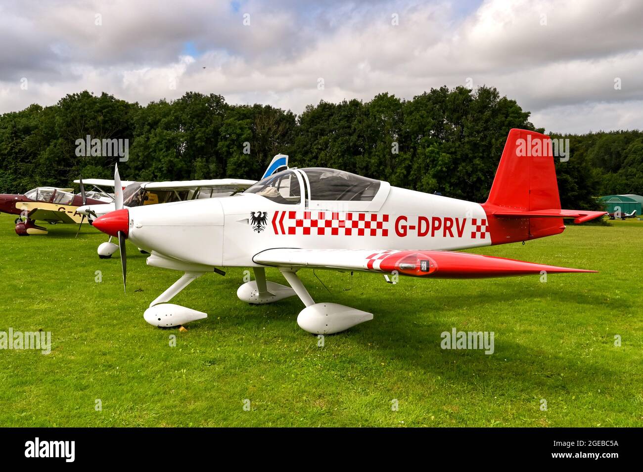 Popham, near Basingstoke, England - August 2021: Van's RV private aeroplane parked on the grass airfield at Popham. Stock Photo