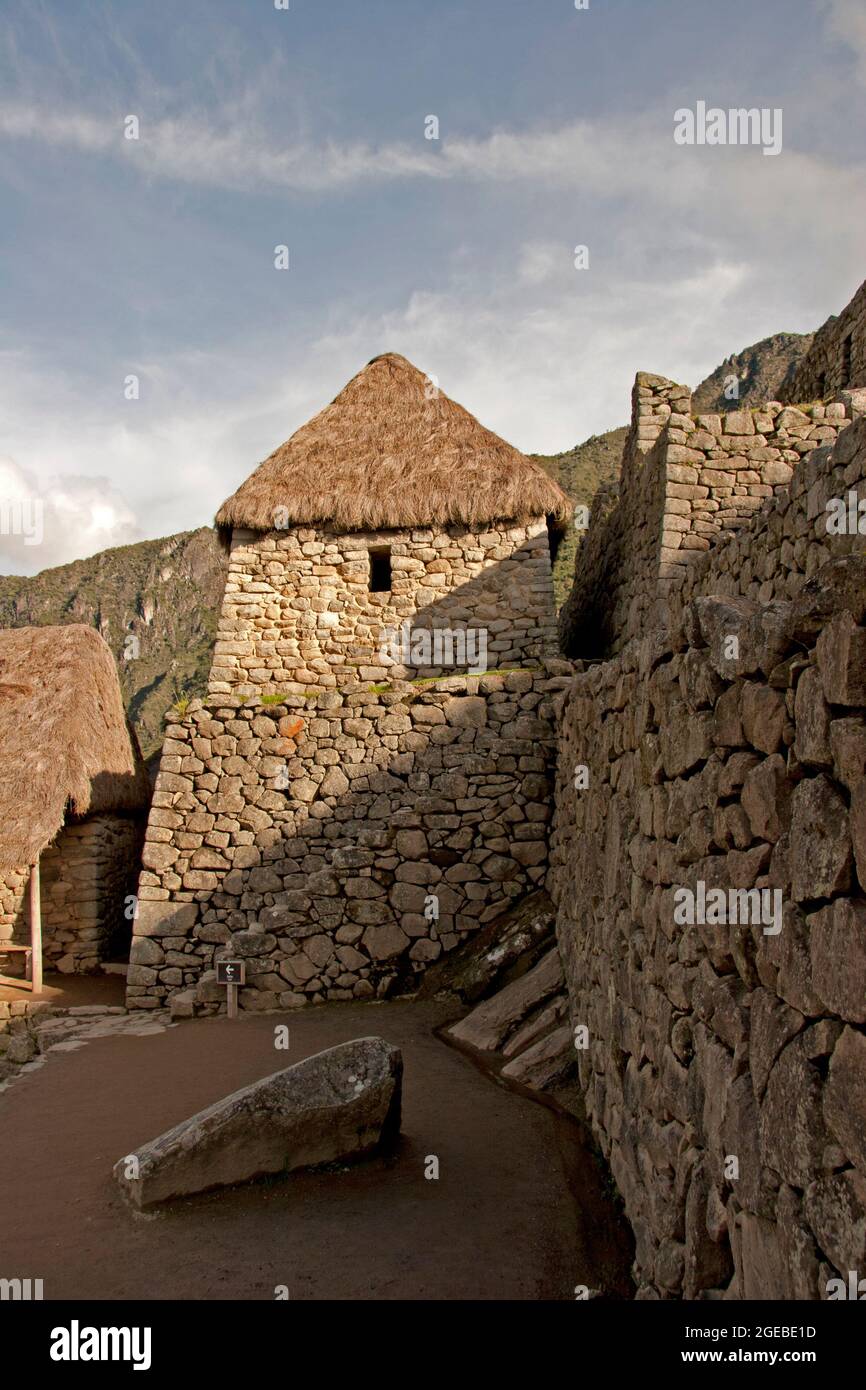 Machu Picchu stone house and stone walls with stairway Stock Photo - Alamy