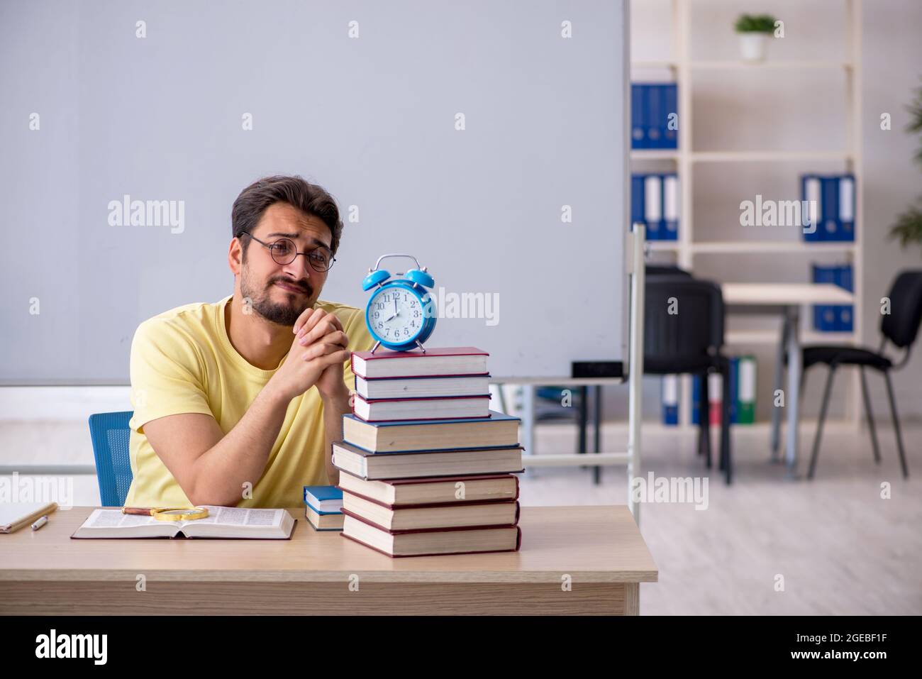 Getting Ready For Testing Young student preparing for exams in the classroom Stock Photo - Alamy