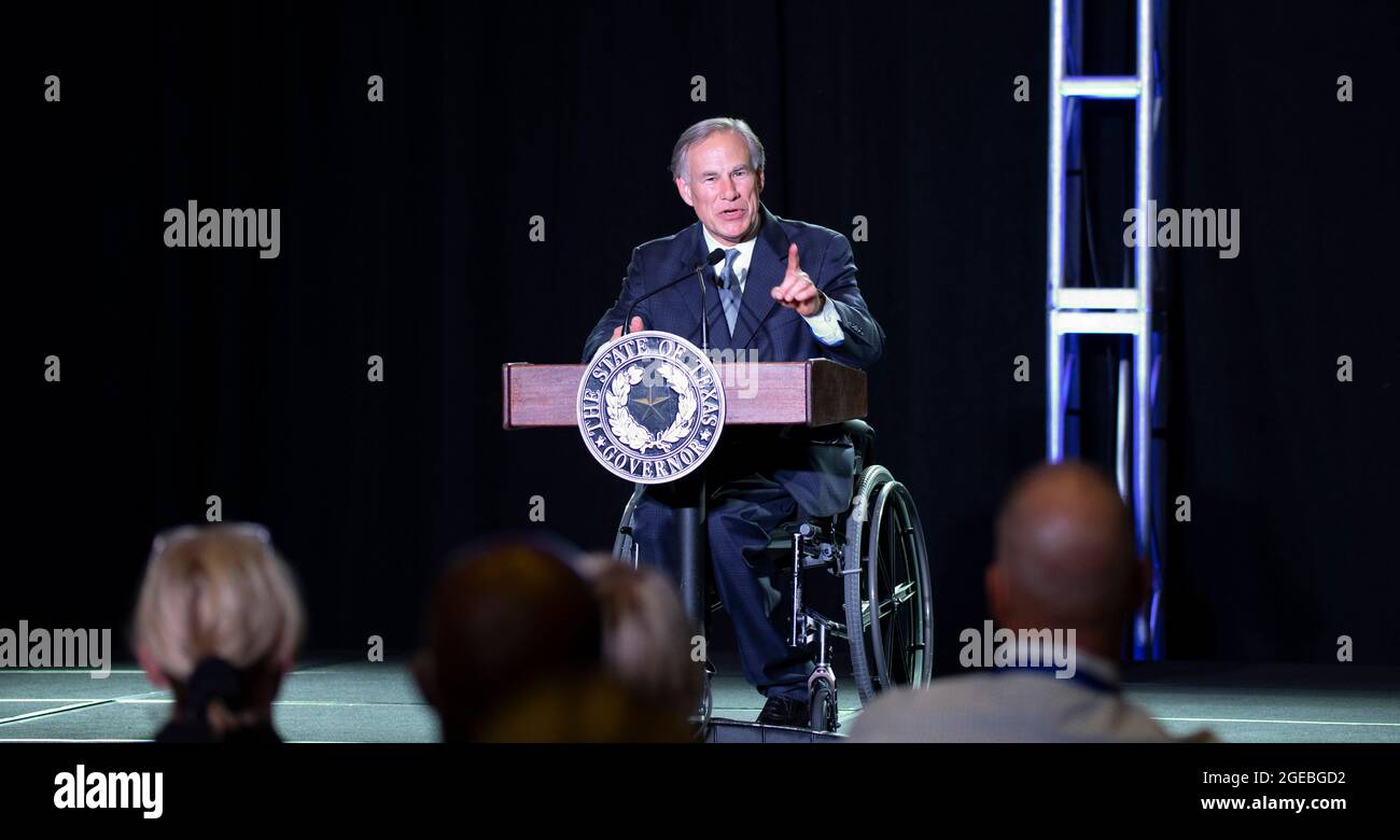 Texas Governor Greg Abbott speaks without a mask to a group of Texas business leaders in Austin on August 9th, 2021 -- eight days before a positive COVID-19 test on August 17th. The governor, who is tested daily, is receiving Regeneron monoclonal antibody treatment and has no reported symptoms. Stock Photo