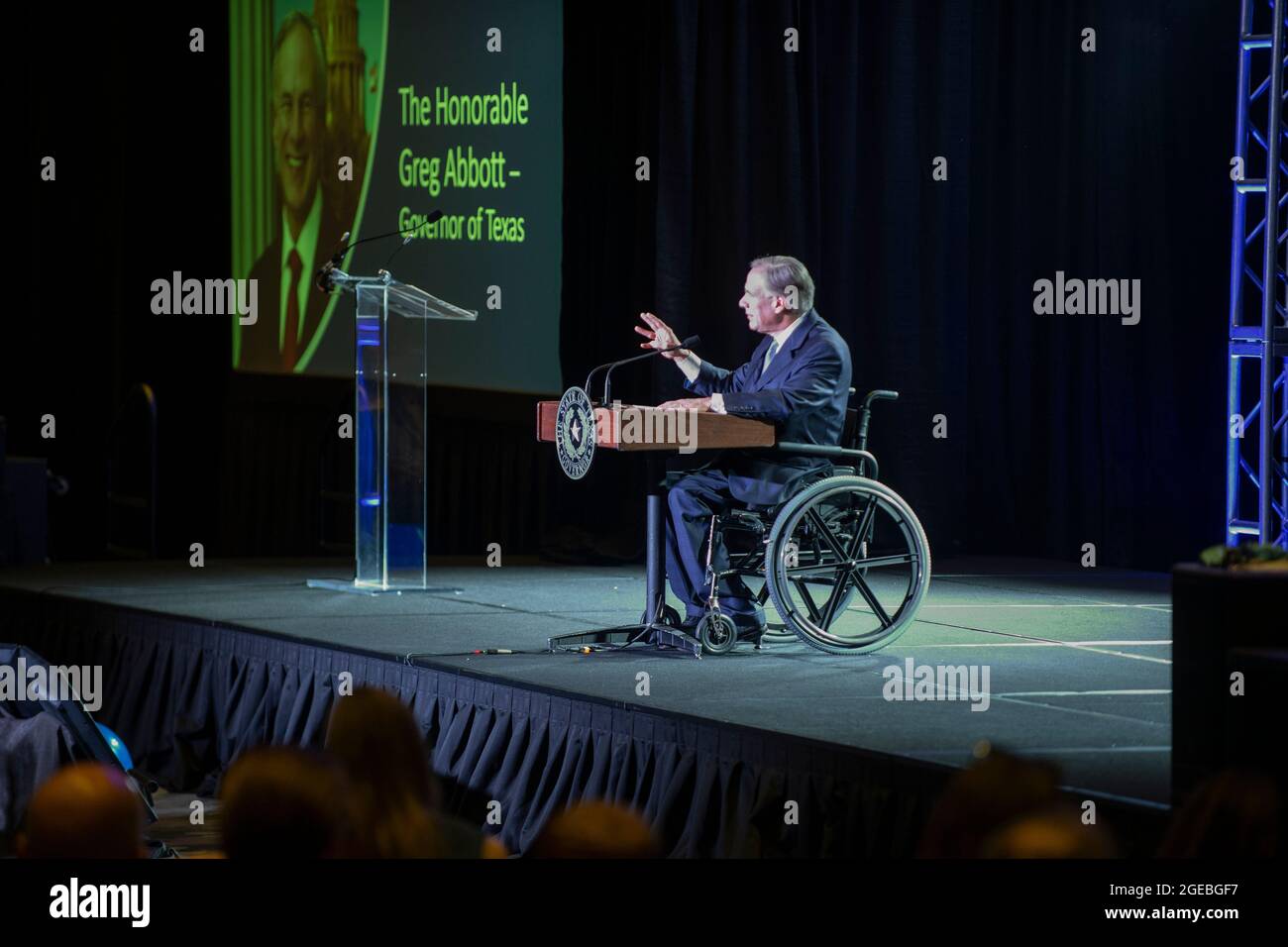 Texas Governor Greg Abbott speaks without a mask to a group of Texas business leaders in Austin on August 9th, 2021 -- eight days before a positive COVID-19 test on August 17th. The governor, who is tested daily, is receiving Regeneron monoclonal antibody treatment and has no reported symptoms. Stock Photo