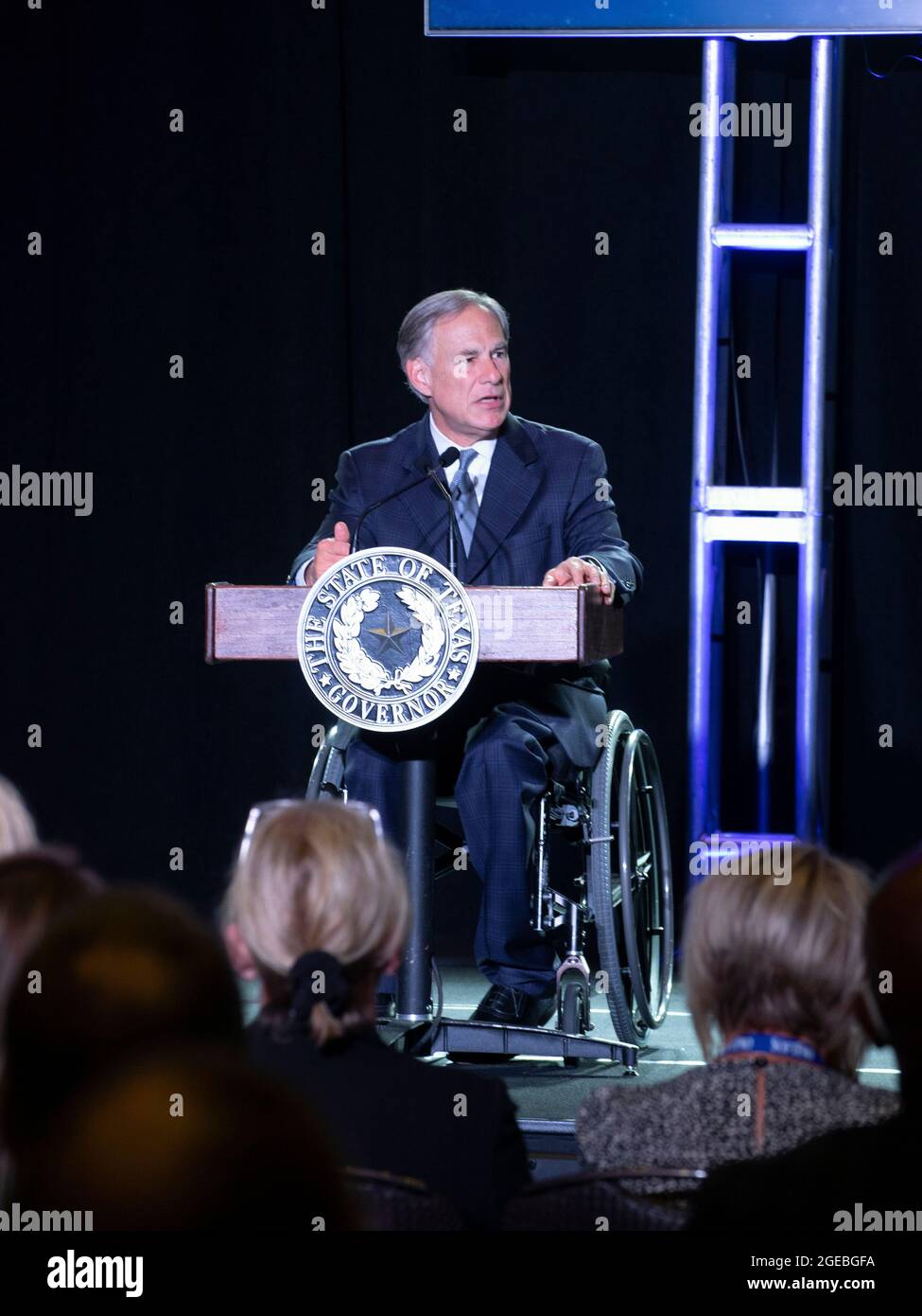Texas Governor Greg Abbott speaks without a mask to a group of Texas business leaders in Austin on August 9th, 2021 -- eight days before a positive COVID-19 test on August 17th. The governor, who is tested daily, is receiving Regeneron monoclonal antibody treatment and has no reported symptoms. Stock Photo