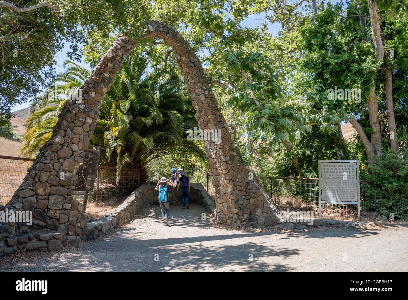 A whimsical stone arch marks the entrance to Cal Poly's architecture canyon, commonly known as the 'architecture graveyard.' Beginning in the 1960s, A Stock Photo