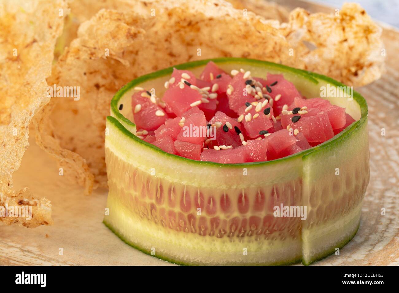 Tuna tartare with black and white sesame seeds with glokamole sauce