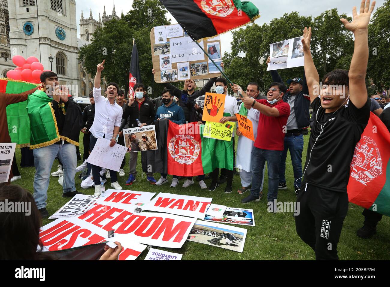 London, UK. 18th Aug, 2021. Protesters shouting slogans as they gesture during the demonstration.Protesters including former interpreters for the British Army gathered in Parliament Square to protest Taliban's takeover of Afghanistan. Politicians returned to Parliament for the day to debate the situation in the country announcing the offer for an initial 5000 places for Afghans fleeing the Taliban in the first year. (Photo by Martin Pope/SOPA Images/Sipa USA) Credit: Sipa USA/Alamy Live News Stock Photo