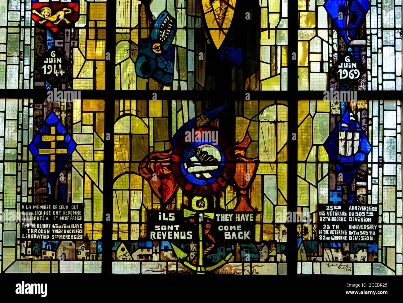 Stained glass window paying homage to american paratroopers, NotreDamedel'Assomption church