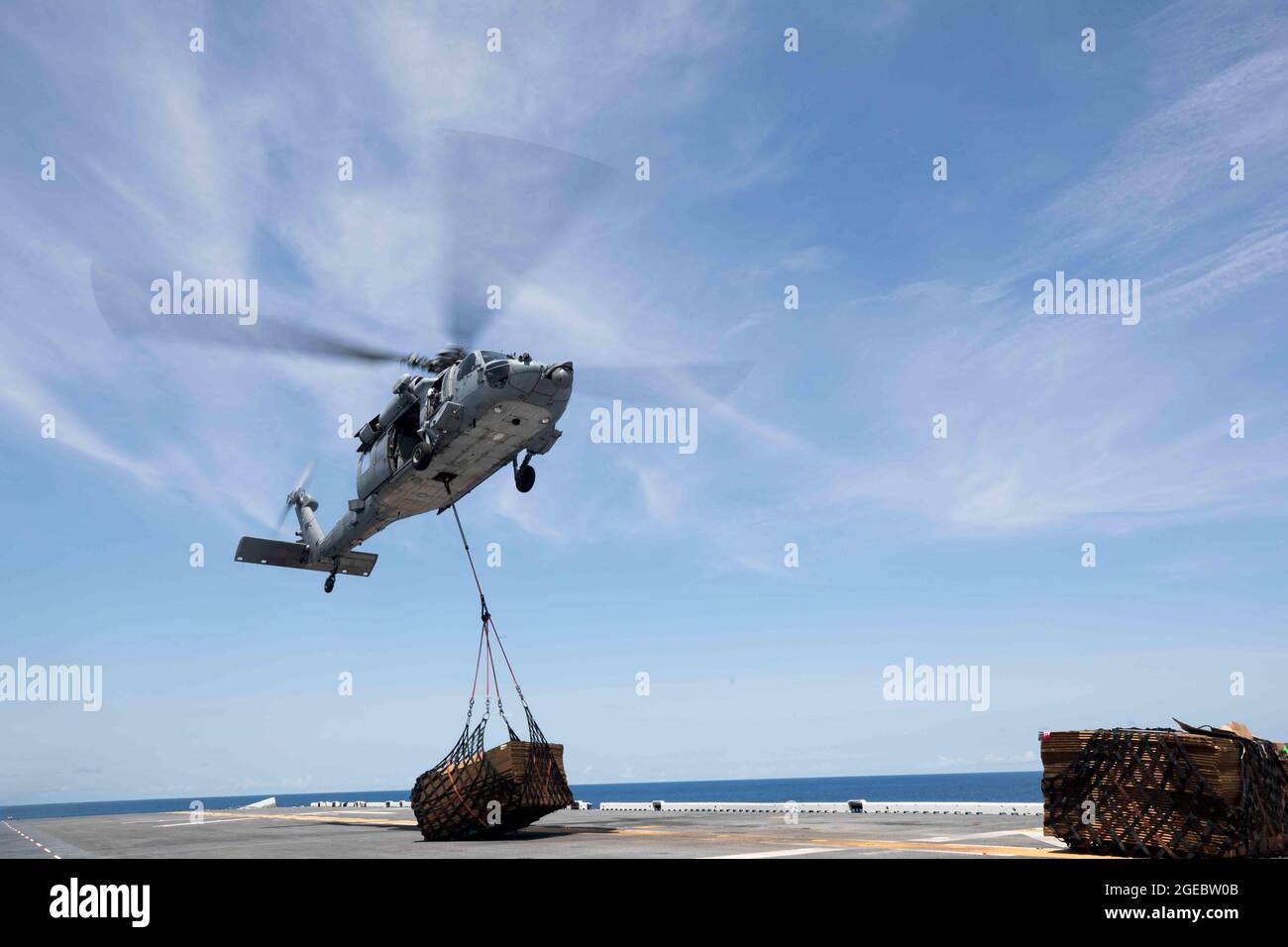 U.S. Navy pilots with Helicopter Sea Combat Squadron 28, transport ...