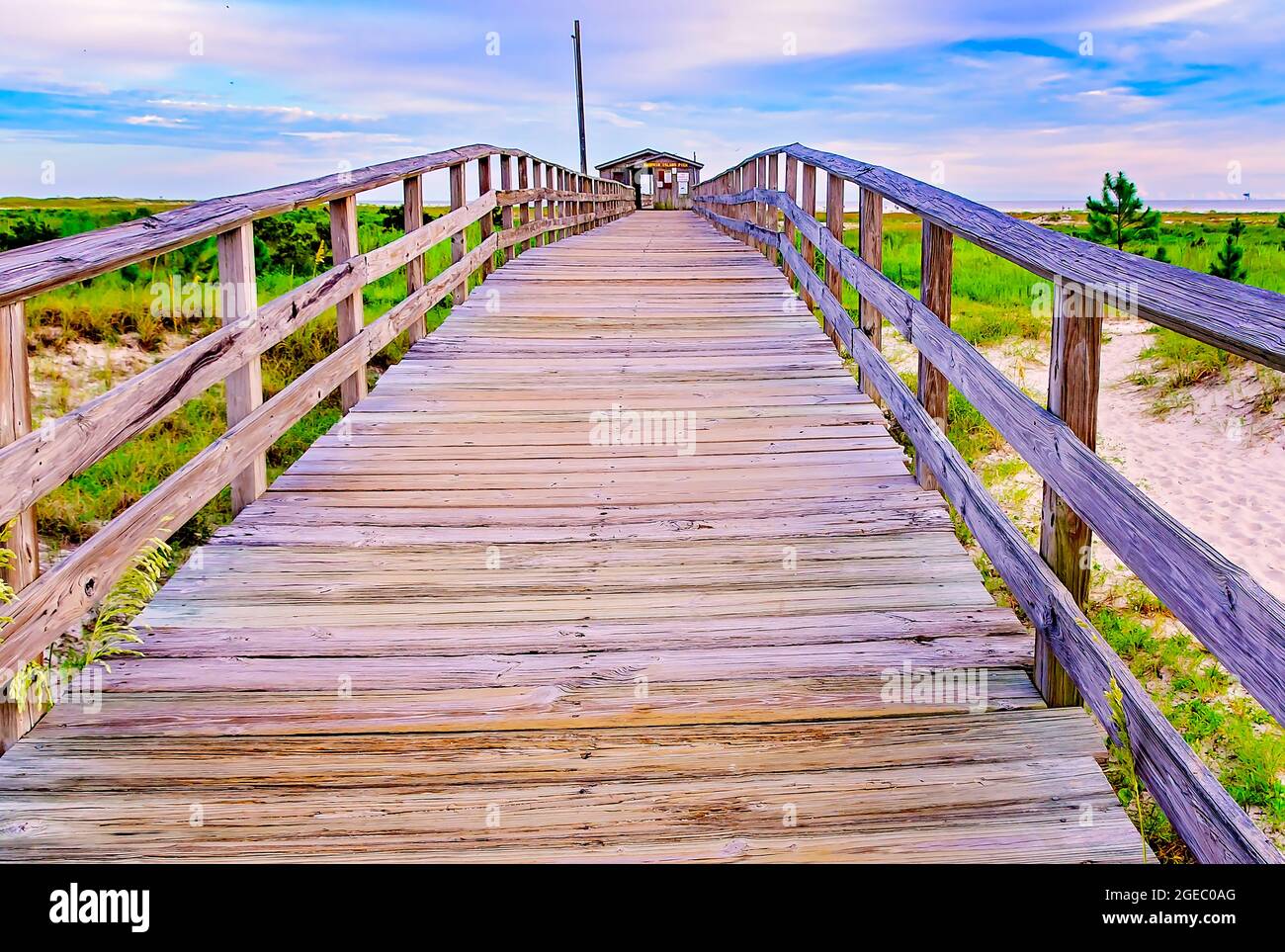 The Dauphin Island Public Beach pier is pictured, Aug. 12, 2021, in Dauphin Island, Alabama. Stock Photo