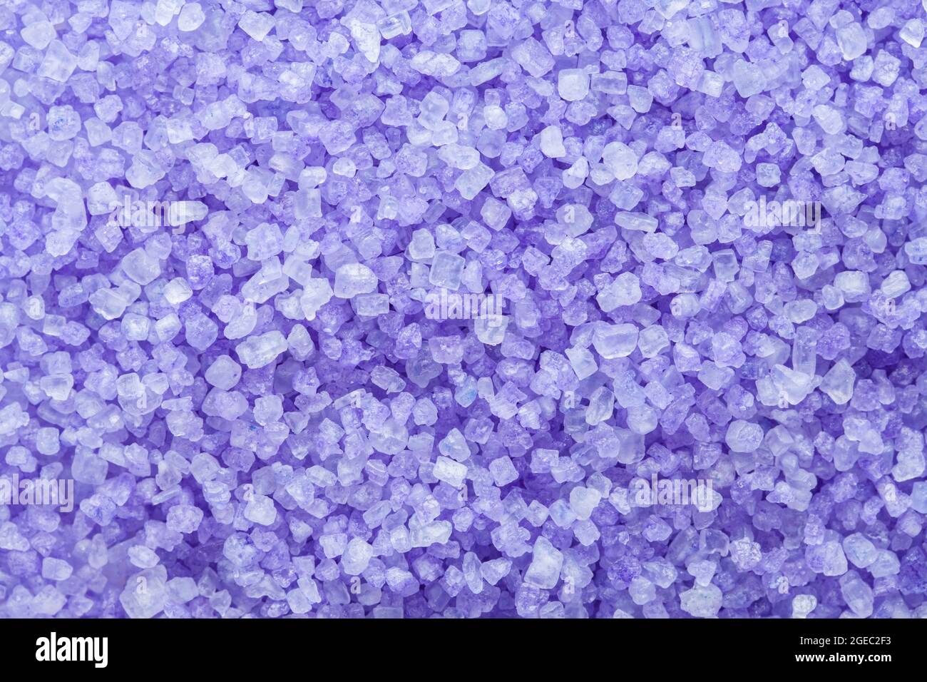 Purple Lavendar Bath Salts Pile Background Texture. Stock Photo