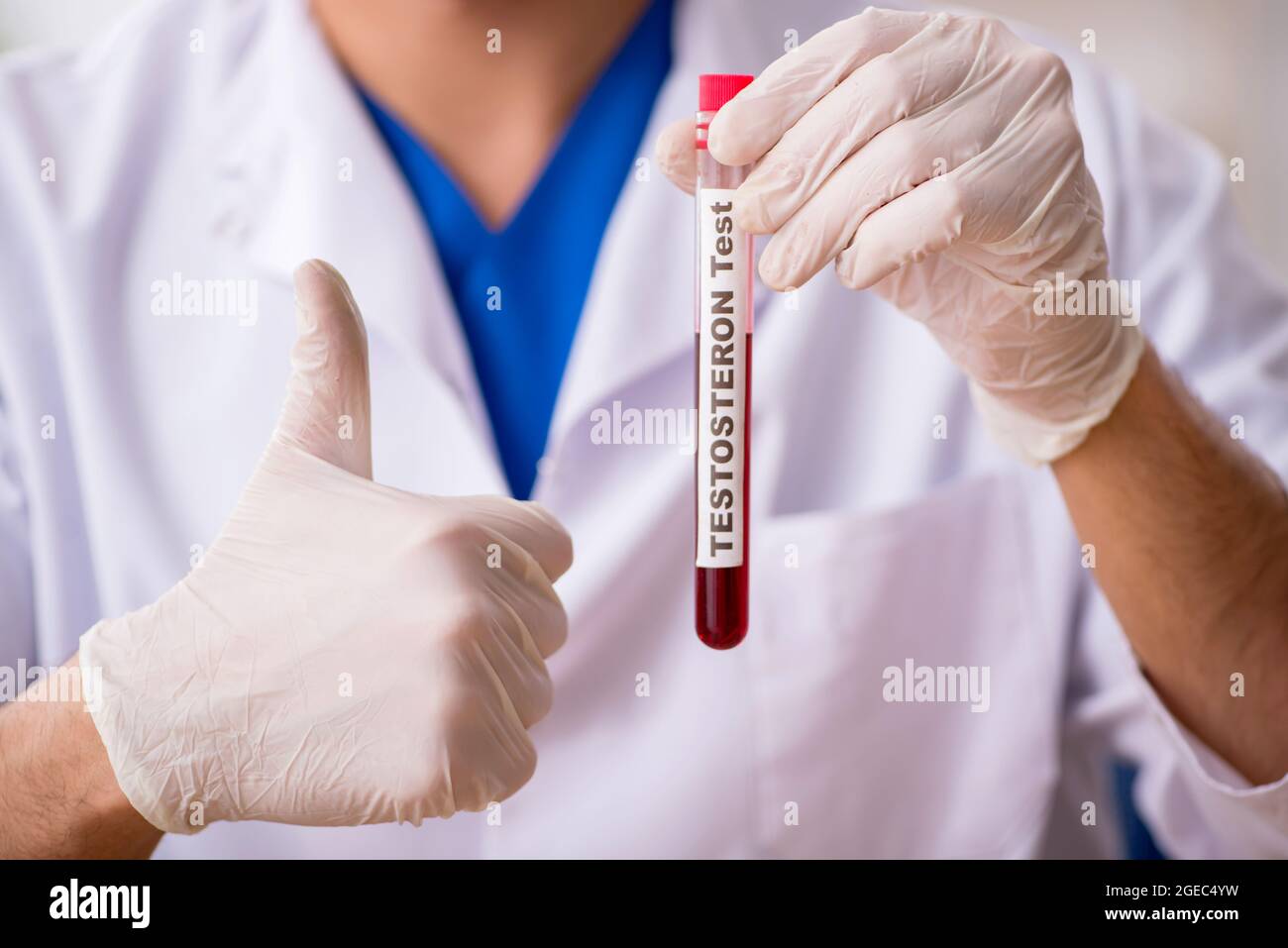Young biochemist testing blood samples Stock Photo