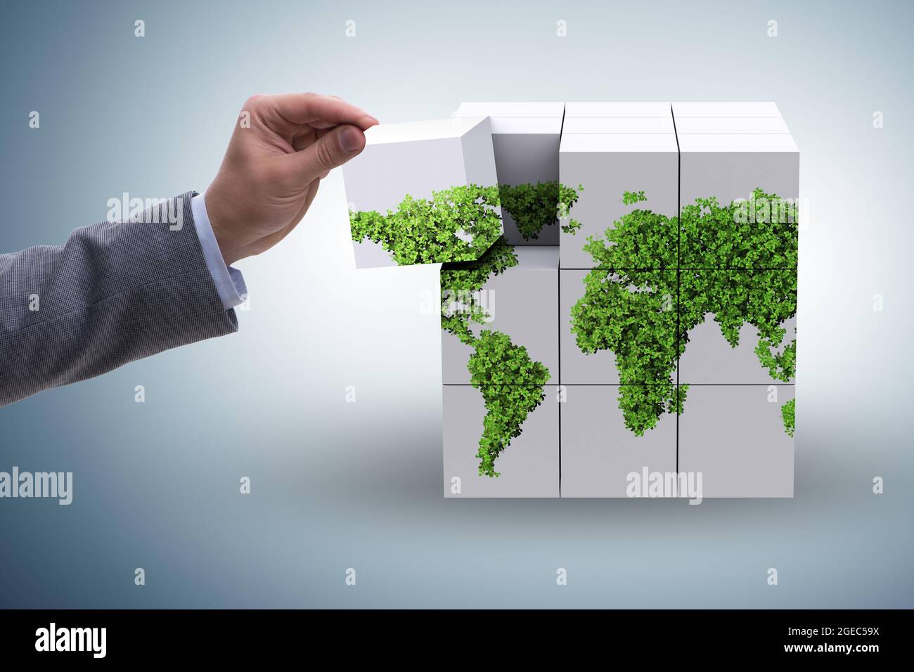 Businessman building world map from the cubes Stock Photo - Alamy