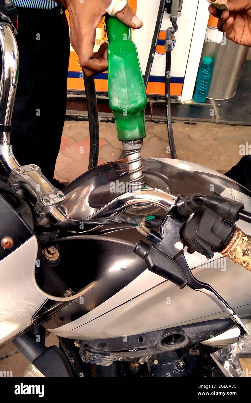 Selective focus of refuel the motorcycle at the gas station, Close up
