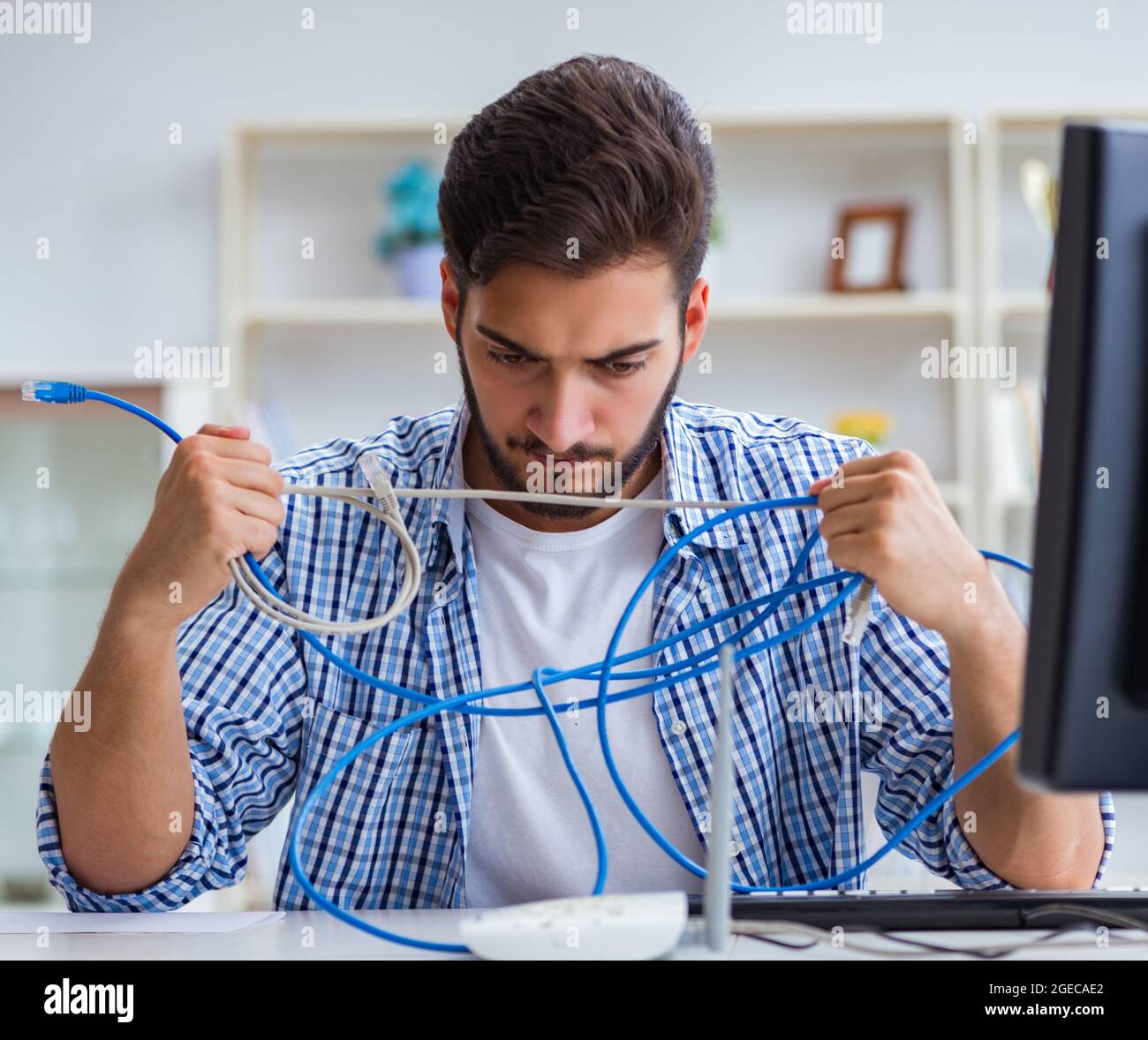 The frustrated young man due to weak internet reception Stock Photo - Alamy