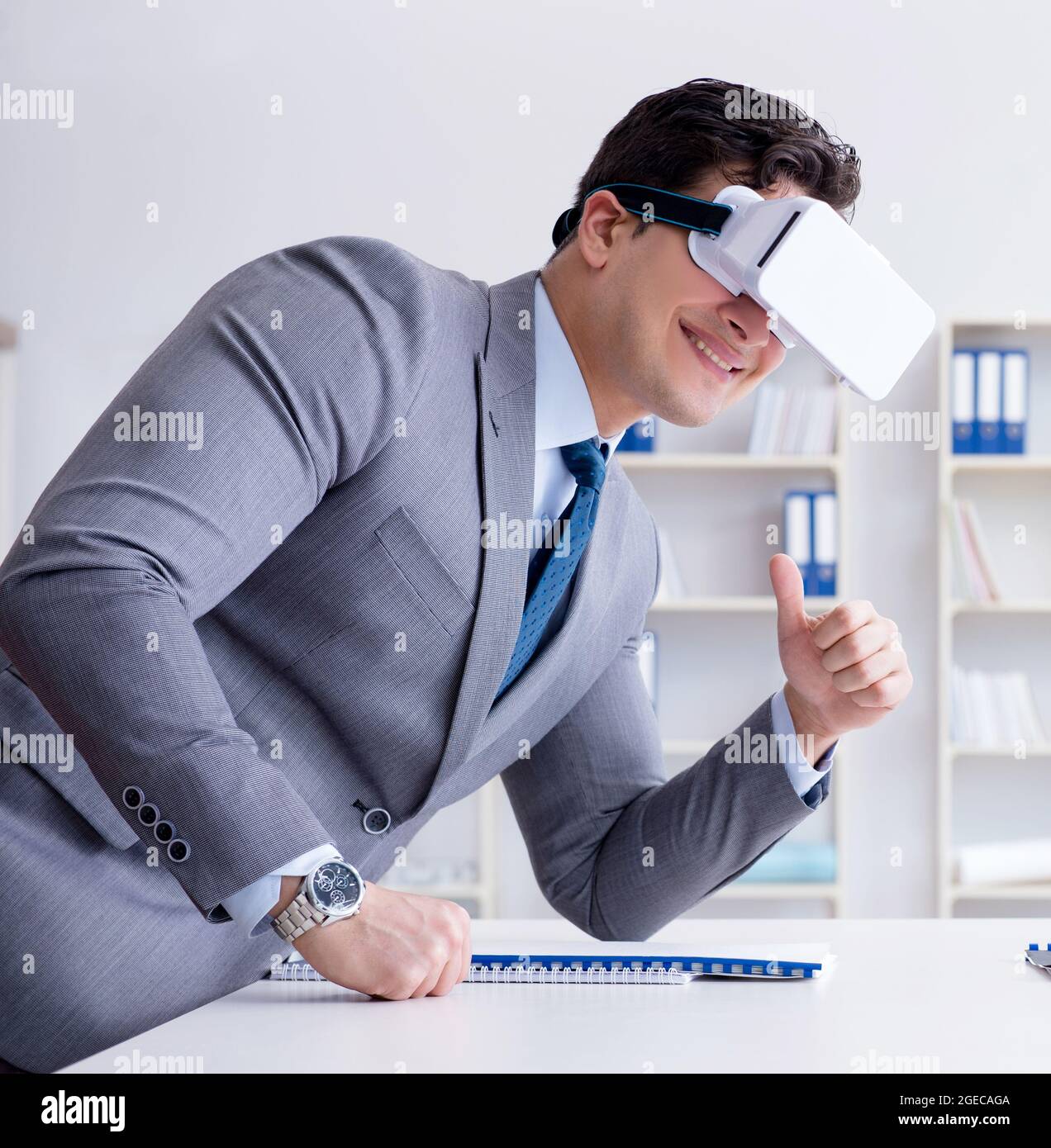 The businessman with virtual reality glasses in the office Stock Photo ...