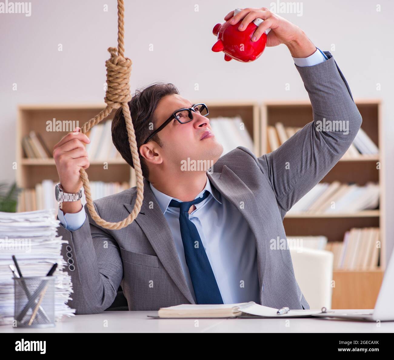 The bankrupt broke businessman considering suicide hanging himself Stock  Photo - Alamy