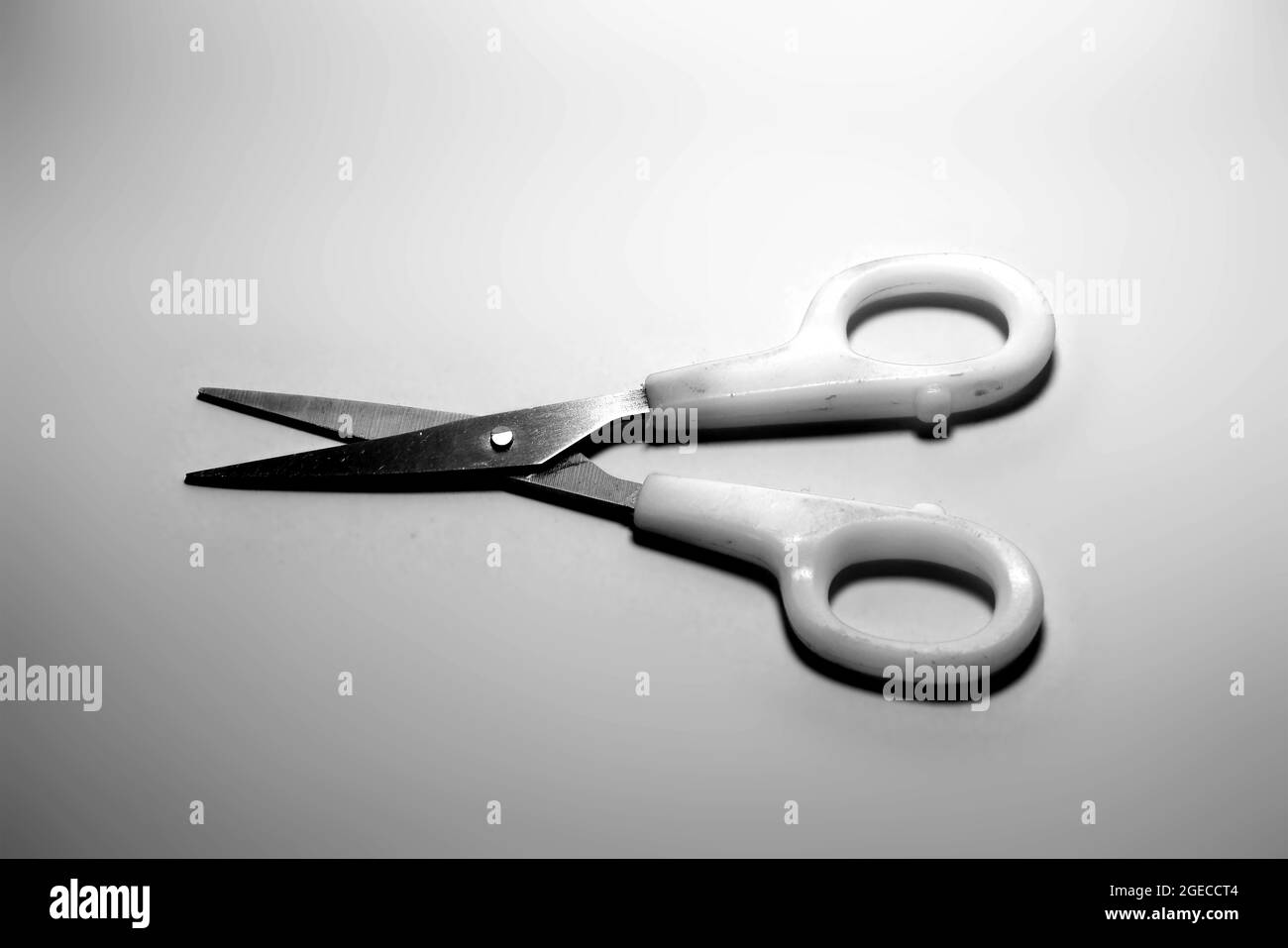 Black and white Scissors hand-operated cutting instruments. Scissors for cutting paper and thin materials on white background Stock Photo