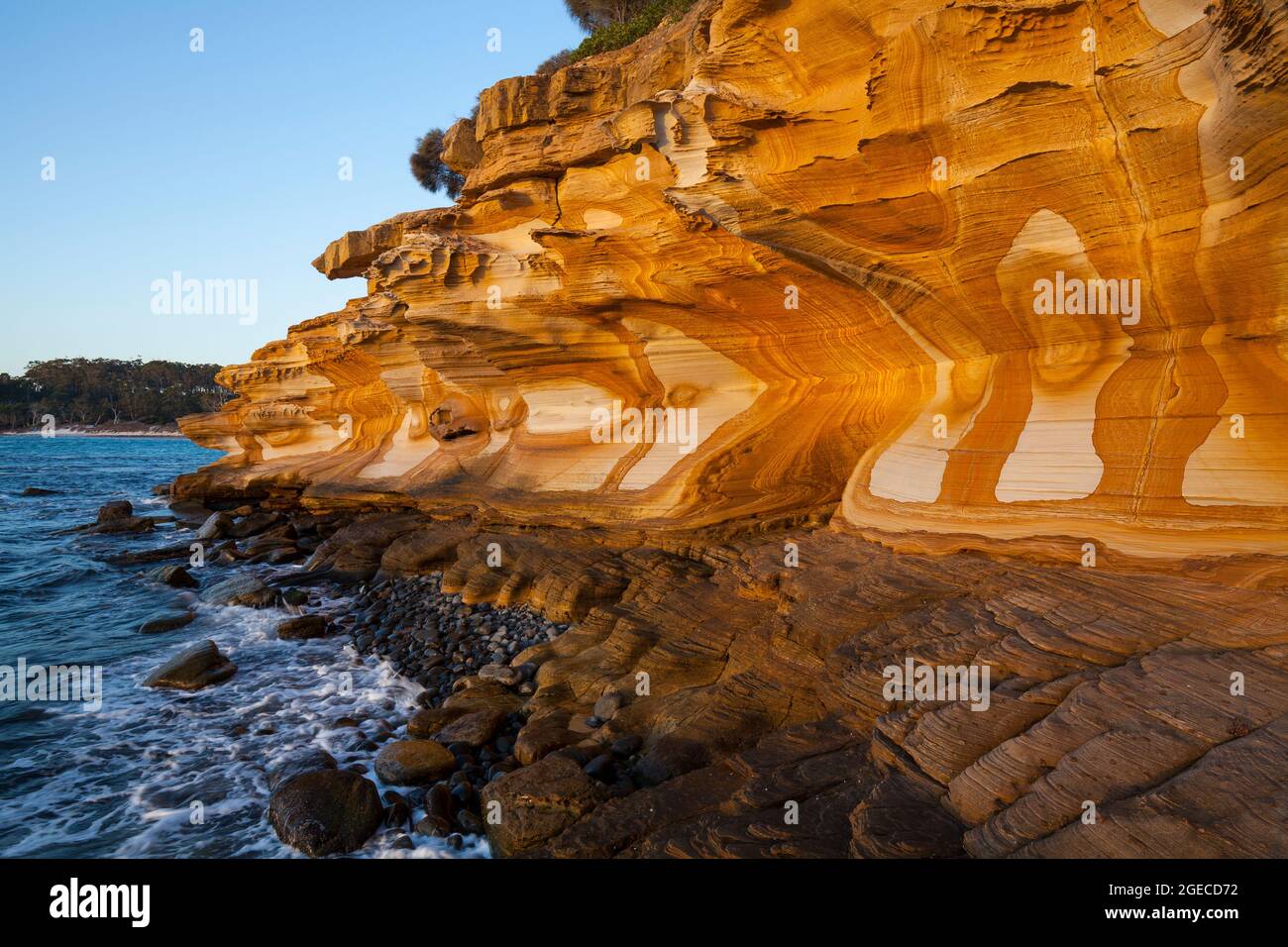 Painted Cliffs at sunset - Maria Island National Park - Tasmania - Australia Stock Photo
