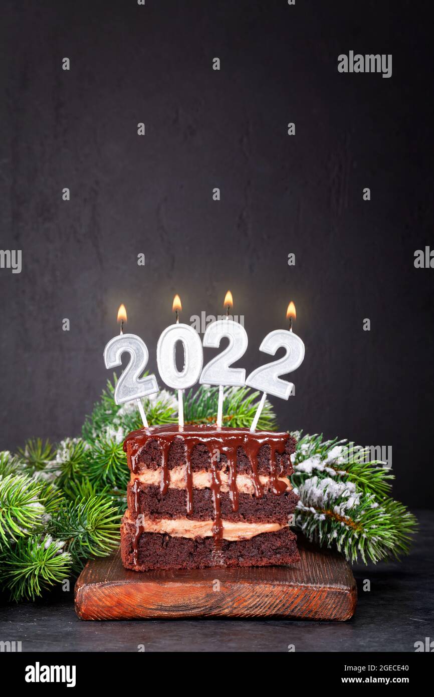 Christmas Cake With Number 2022 Burning Candles And Fir Tree. With Copy Space For Your Xmas Greetings Stock Photo - Alamy