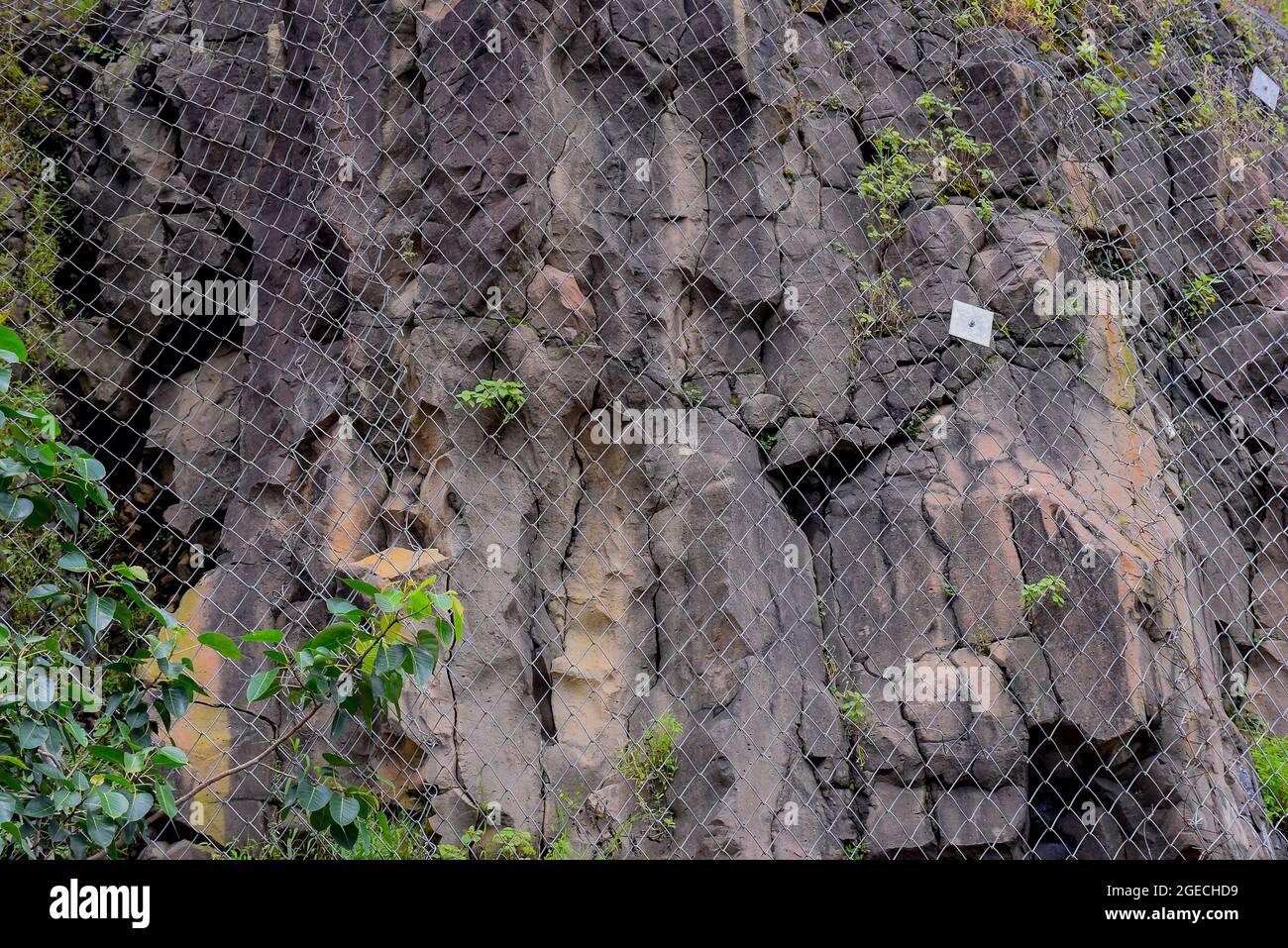trap made of iron to stop the stones falling from the mountain Stock