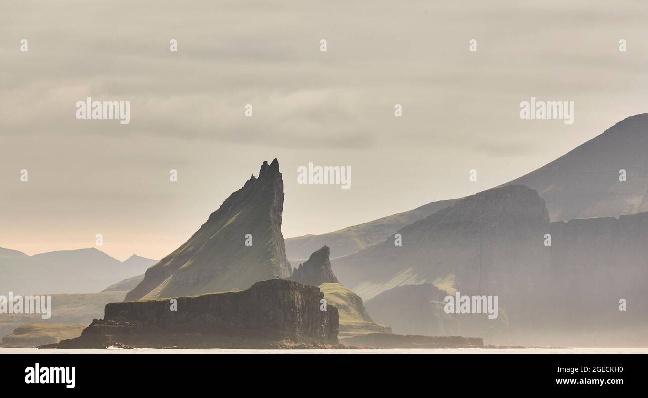 Faroe islands sunset dramatic coastline landscape in Vagar island ...