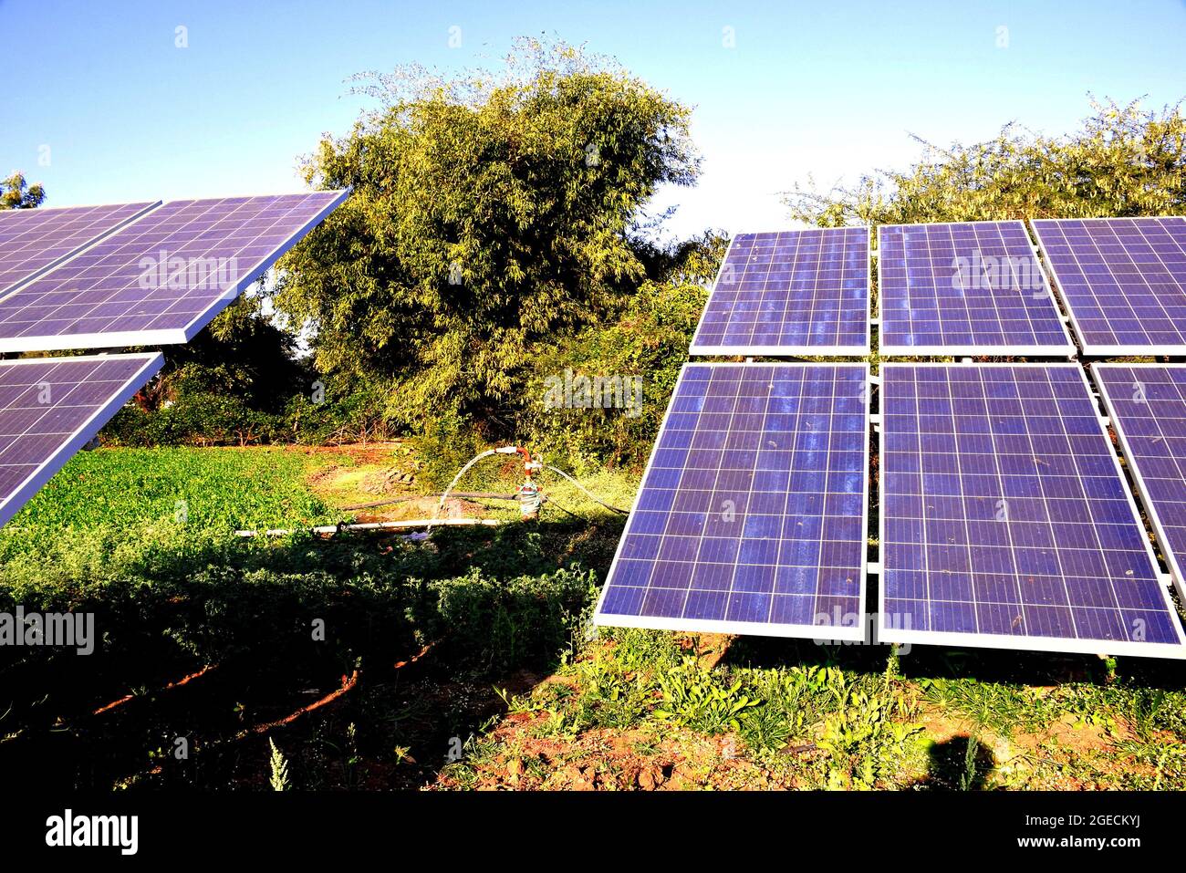 agricultural equipment for field irrigation, solar panel's, behind which is water jet. Stock Photo