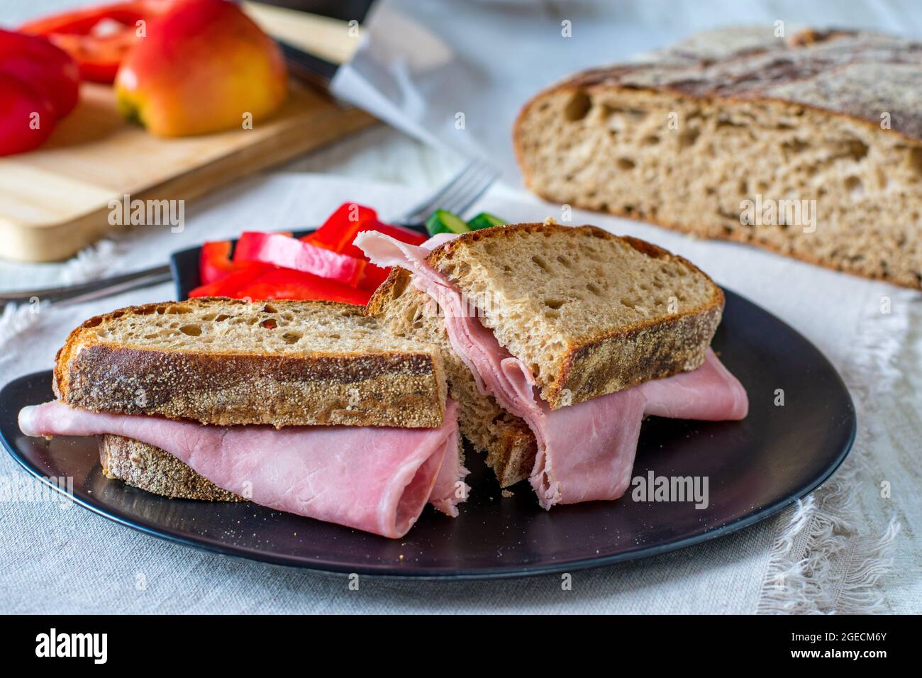 Sandwich with thin sliced ham on swiss ruch bread Stock Photo