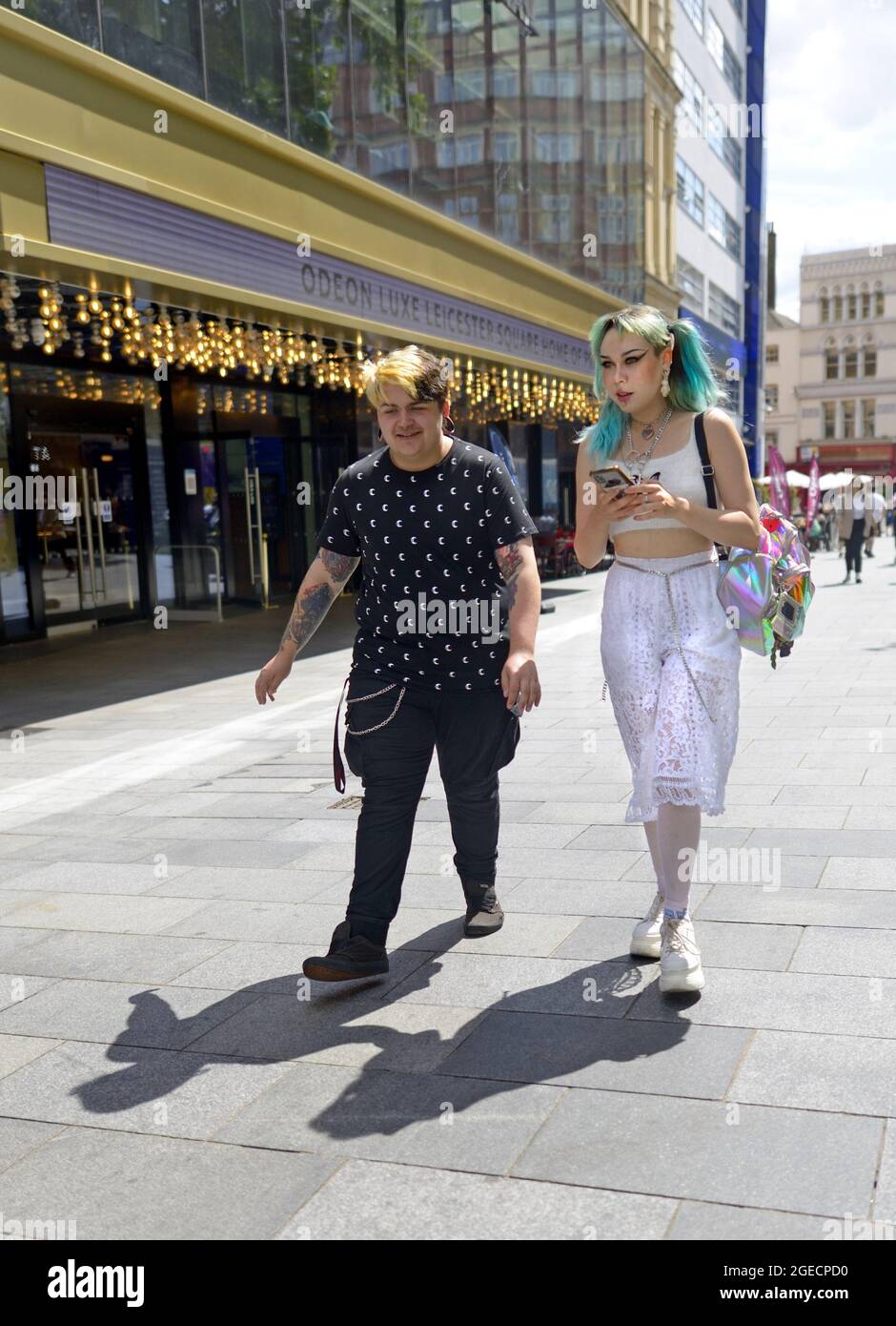 London, England, UK. Young people with distinctive clothes and makeup in Leicester Square Stock Photo