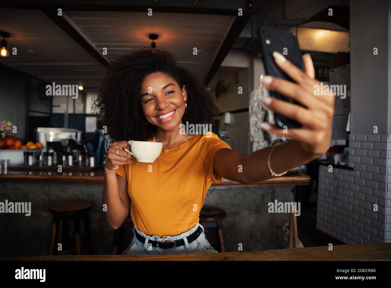 Woman taking book counter hi-res stock photography and images - Alamy