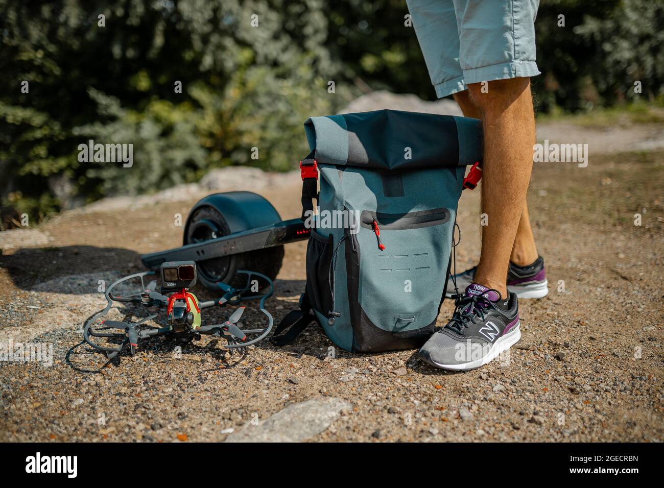 Man with a backpack ready to walk a long road and explore the world