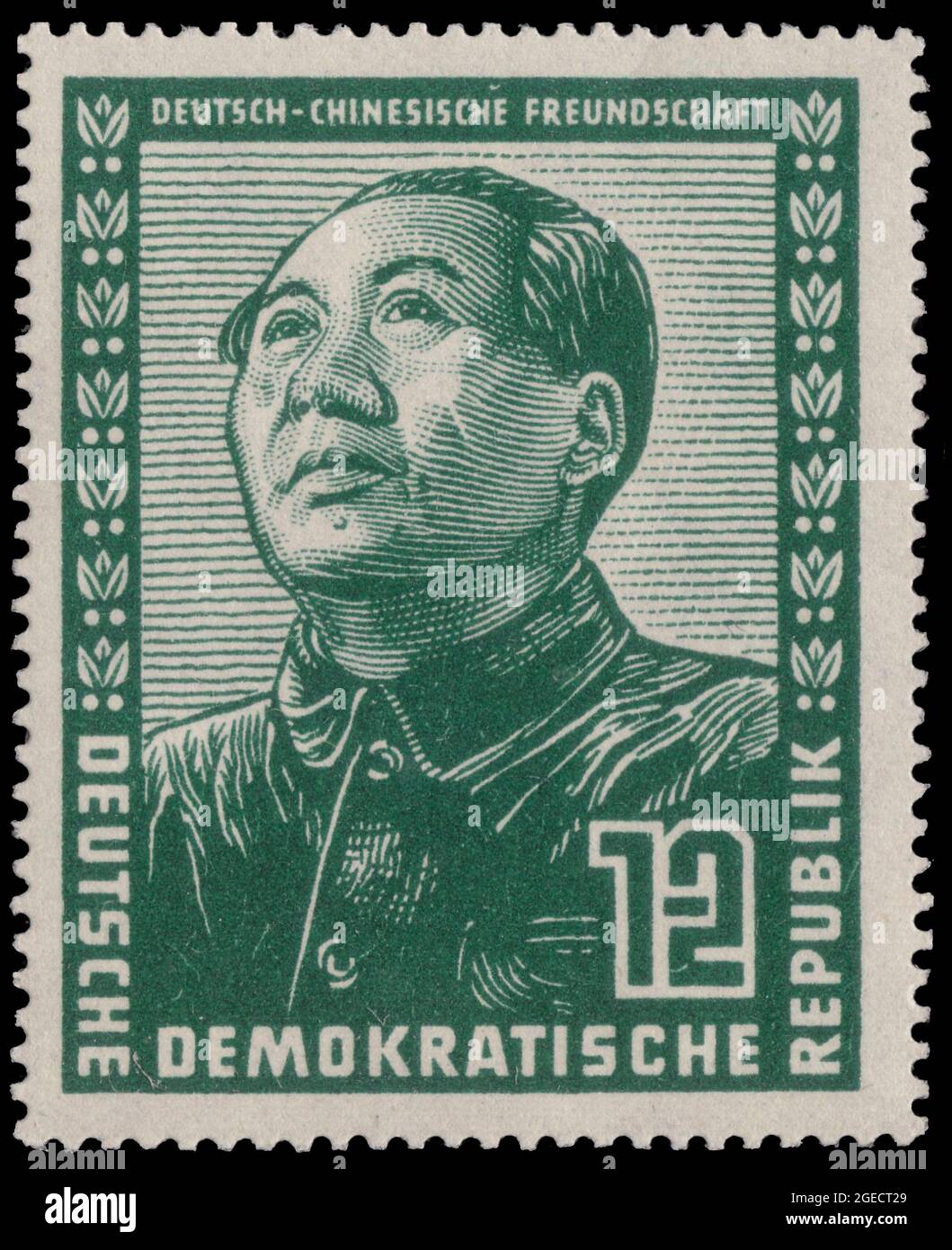 DDR [Deutsche Demokratische Republik (German Democratic Republic), official name of the former East Germany] Depicting Mao Zedong [Mao Tse-tung] 12pf Stock Photo