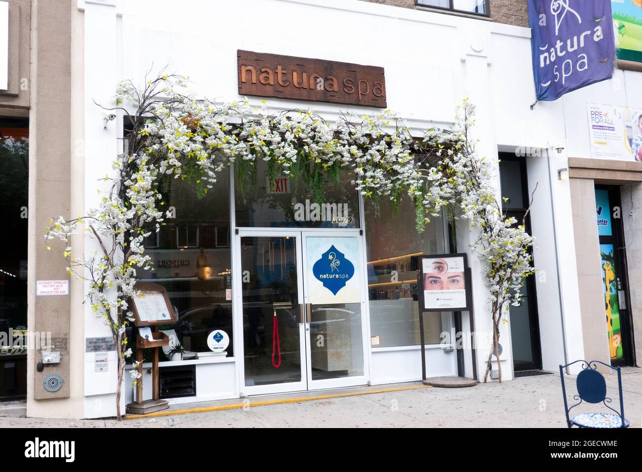 The ornate exterior of the Natura Spa,  space for hair treatments, massages, waxing, nails & facials. On Steinway St in Astoria, Queens,New York. Stock Photo