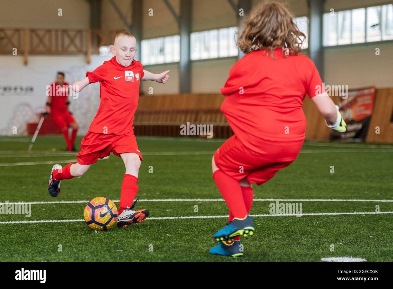 MACHNICE, POLAND - APRIL 6, 2019: Training of National Junior AMP Football team during grouping of children and adolescents after amputations and with Stock Photo