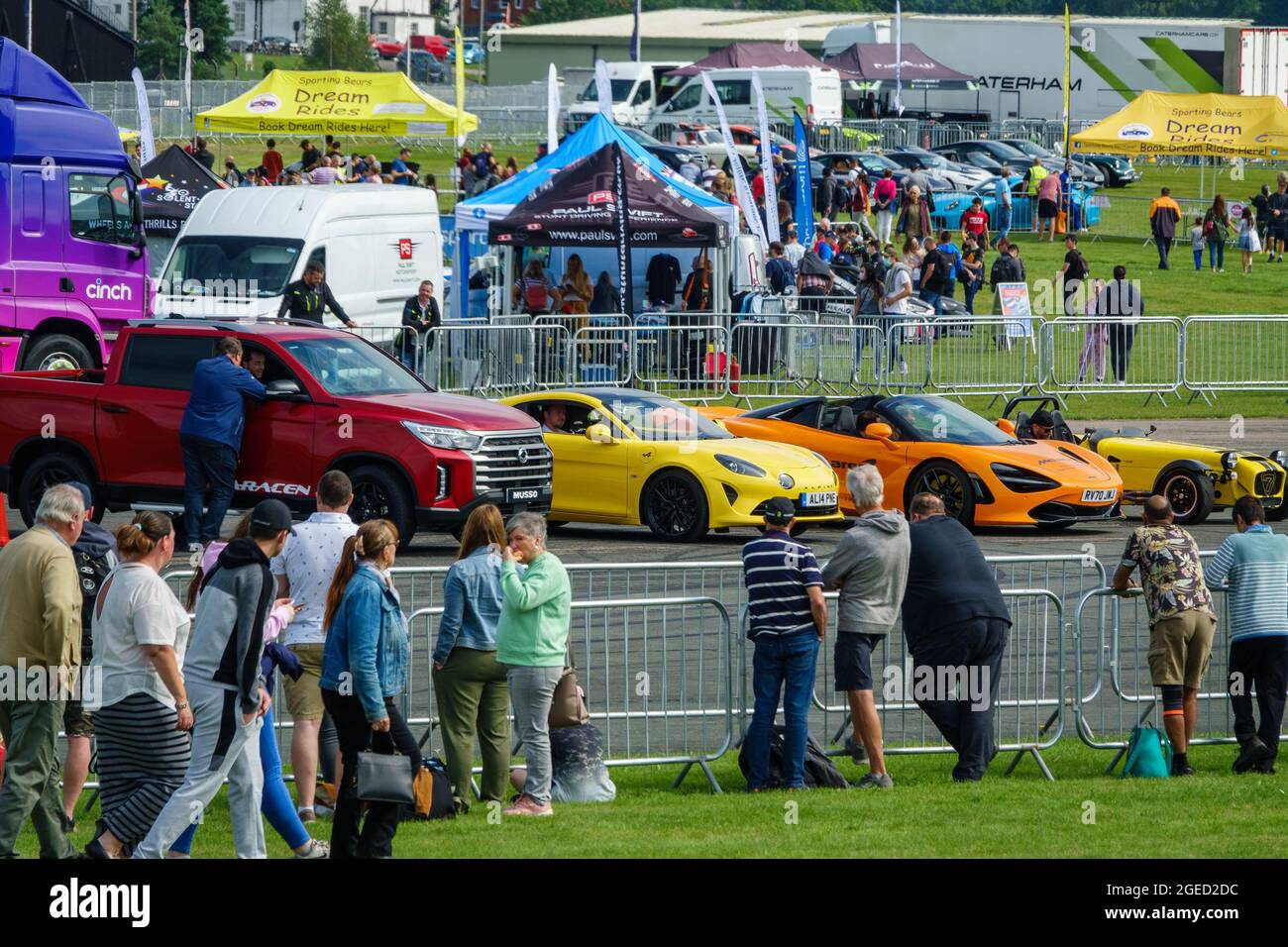 Farnborough, 19th August, 2021. The British Motor Show opens for a three day exhibition of motorsport, classic cars, electric cars and supercars at Farnborough International Exhibition and Conference Centre. Stock Photo