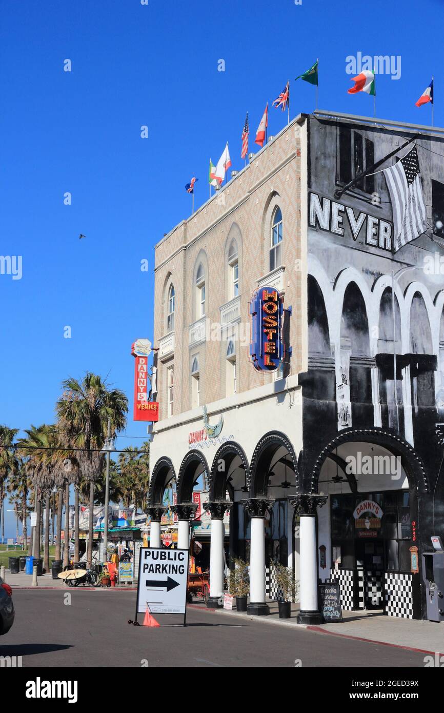 VENICE, UNITED STATES - APRIL 6, 2014: People visit Venice Beach, California. Venice Beach is one of most popular beaches of LA County. 9.8 million pe Stock Photo