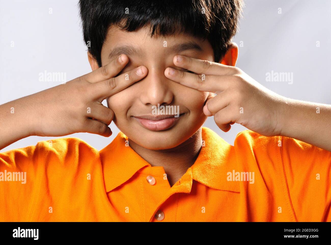 Monkey covering eyes hands hires stock photography and images Alamy