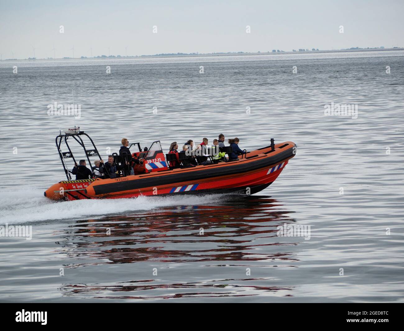 Tourist powerboat on the North Sea from Oudeschild, Texel island, the Netherlands Stock Photo