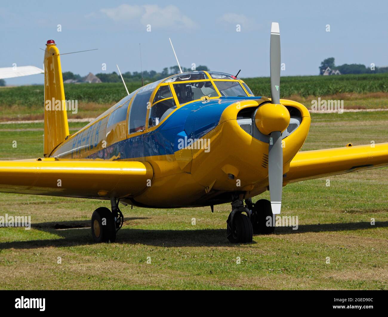 Classic propeller driven aeroplane on the ground at Texel island airfield, the Netherlands Stock Photo