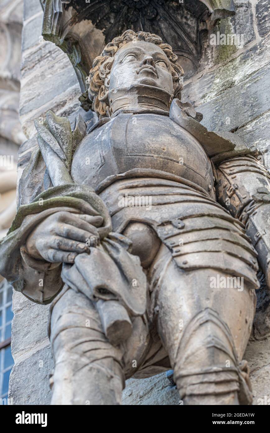 Ancient statue portrait of Saint Maurice (black Knight) as gatekeeper in Magdeburg Cathedral as Roman soldier from Thebes of 13 century, Magdeburg, Ge Stock Photo