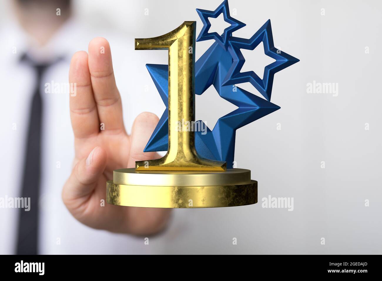 Gold winner first place render of a champion in a hand Stock Photo - Alamy
