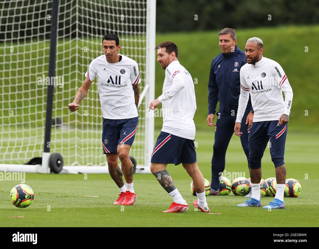 Paris, France. 19th Aug, 2021. Lionel Messi (2nd L), Neymar (1st R) and Angel Di Maria (1st L) of Paris Saint-Germain attend a training session at the Camp des Loges Paris Saint-Germain football club's training ground in Saint-Germain-en-Laye, northwest of Paris, France, Aug. 19, 2021. Credit: Gao Jing/Xinhua/Alamy Live News Stock Photo