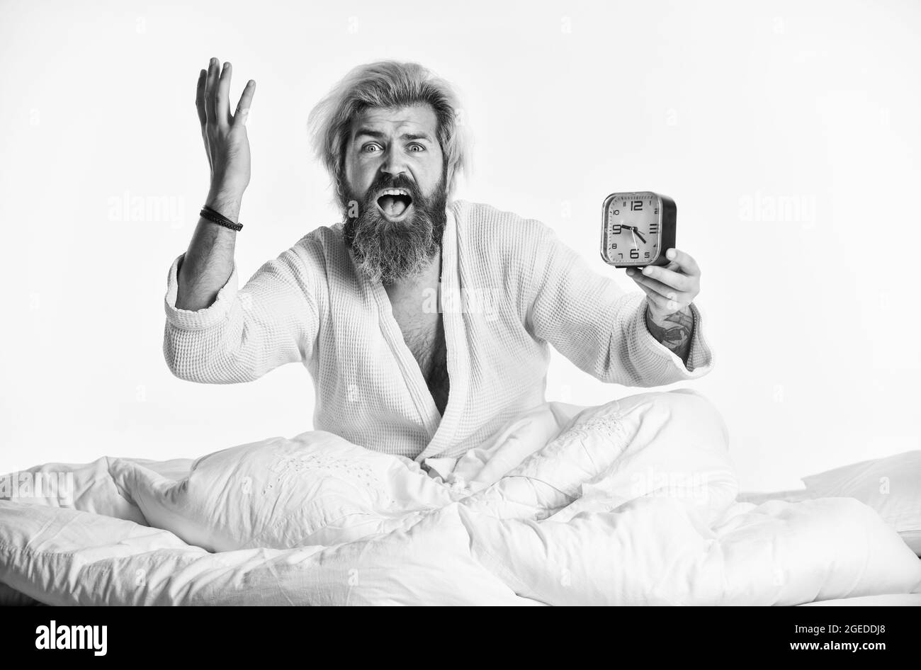 Stop ringing. time to wake up. early morning routine. bearded man in ...
